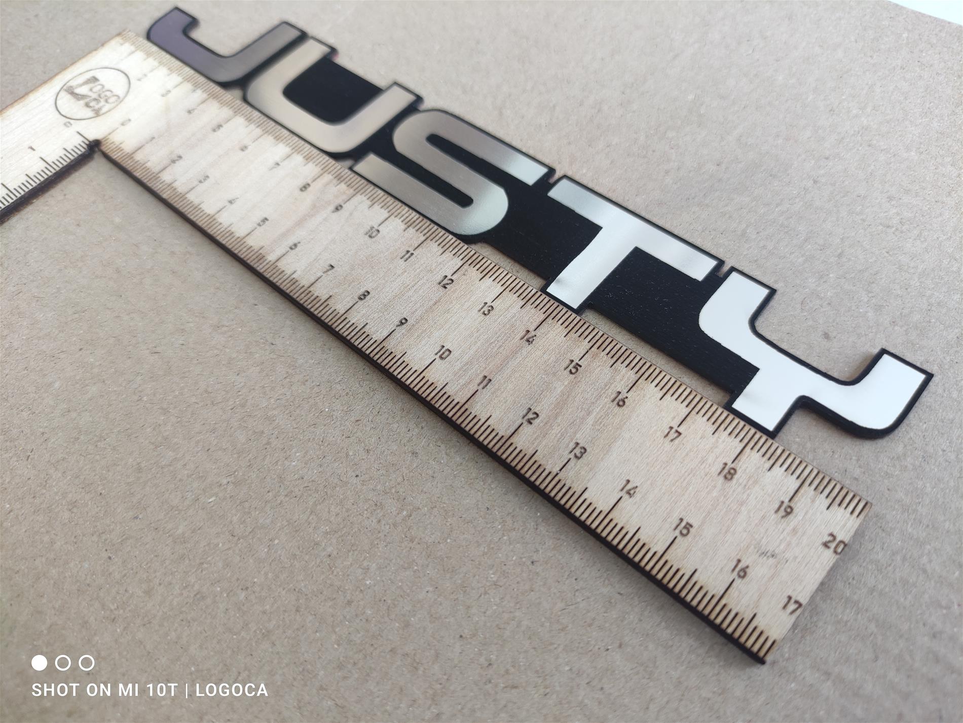 Subaru justy bagaj yazısı